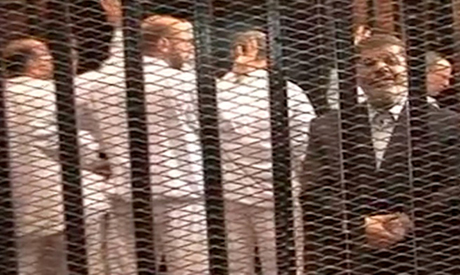Egypt's Morsi trial reset to 1 February as fog prevents his transfer to court