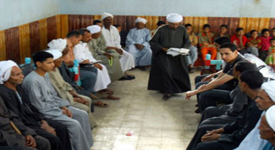 Customary reconciliation session between Muslims and Christians in Kafr Jazirah