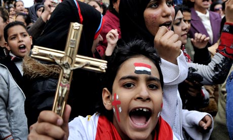 Egypt: a year after attacks, Coptic Christians worship atop church ruins