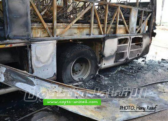Police investigate the burning of bus owned by Coptic church at Mit Ghamr