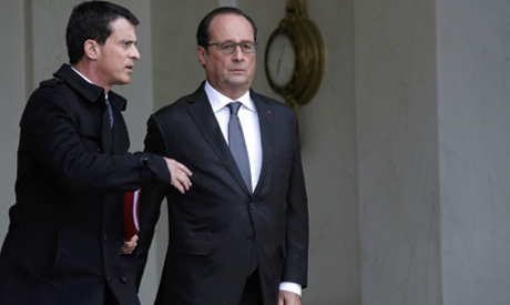 France vows 'merciless' response after Paris attacks kill 128