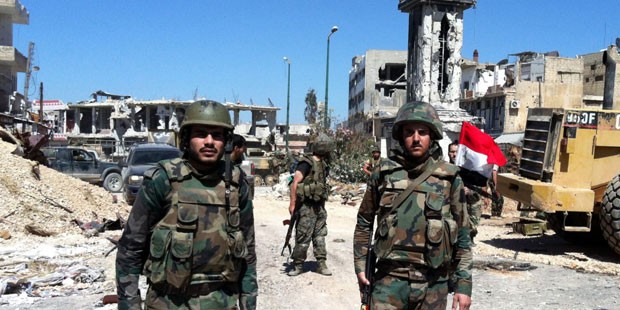 Syrian army battles Islamic State for third day near key road