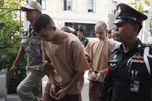 Thai police say 15 bomb suspects at large as two appear in court