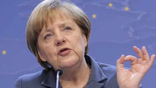 After attacks, Merkel cuts short holiday to face refugee policy storm
