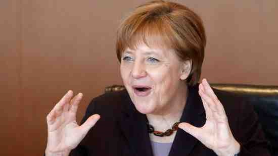 Germany 'will manage' challenge after attacks, says Merkel
