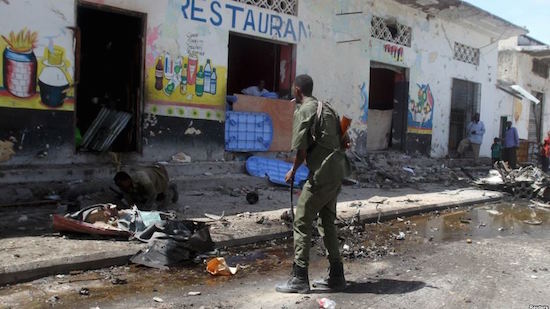 Twin suicide bombs claimed by al Shabaab kill 20 people in Somalia