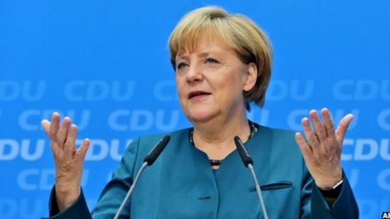 Merkel urges Turks not to bring conflicts to Germany
