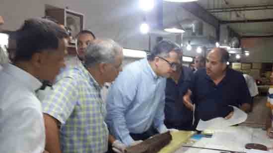 Egypt's antiquities minister attends lifting of newfound beam of Khufu's second boat
