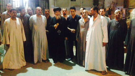 Bishop Makarios visits victims of sectarian clashes at Asim village