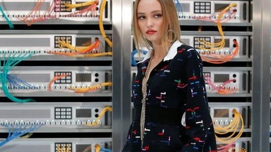Chanel makes fun of how much technology was part of people's lives

