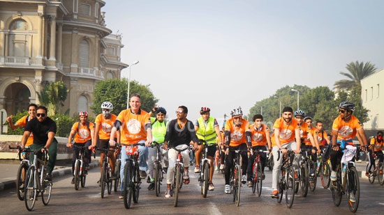 Zamalek streets turn orange as 5,000 cyclists join Dutch embassy's annual bike ride

