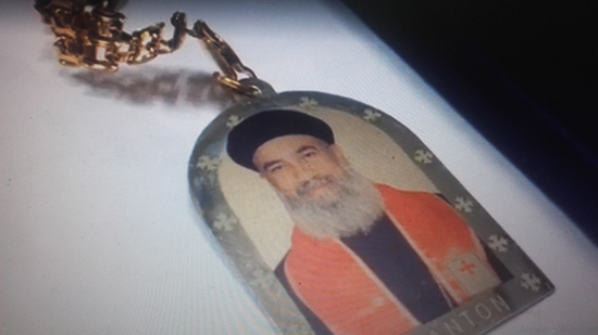 A priest in Austria distributes medals on the Copts bearing his image!

\