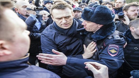 Kremlin critic Navalny in court after protests
