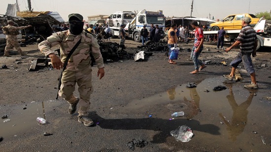 Suicide bombers kill three in northern Iraq restaurant