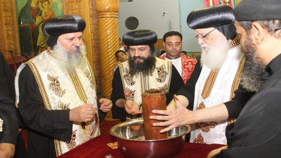 3 bishops perfume the remains of St. Goerge at his feast