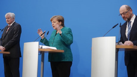 Germanys top parties reach deal on Merkel coalition