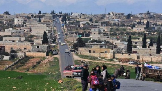 Turkish forces surround Syrian Kurdish city