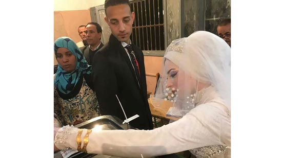 Egyptian pride and groom celebrate their wedding in electoral headquarter