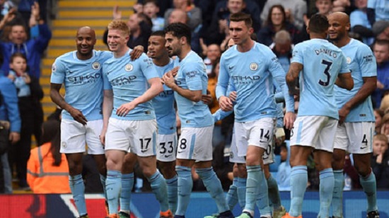 Man City power past Swansea in search of records