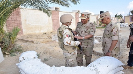Egypts Defence Minister Mohamed Zaki inspects troops in North Sinai