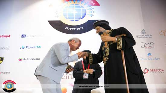 Pope Tawadros honors Naguib Sawiris after participating in the World Youth Conference