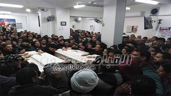 Church holds funeral of two Copts killed by policeman