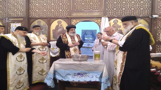 Bishop of Qubba Gardens perfumes the remains of St. Demiana in Waily