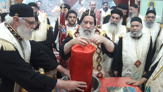 Bishop of Qena perfumes the remains of St. Moussa the Black on his feast