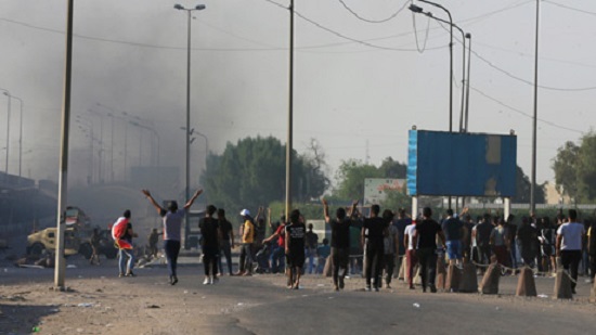 Iraq curfews, shootings as 21 die in anti-government rallies
