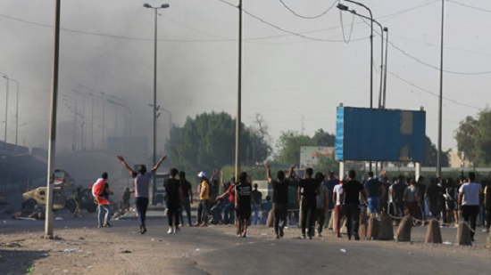 Iraq curfews, shootings as 21 die in anti-government rallies
