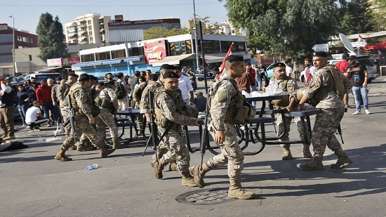 Lebanese troops open roads closed by protesters
