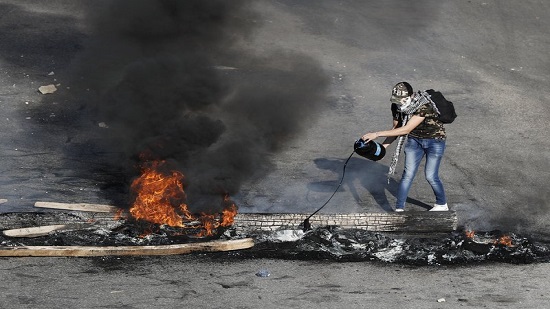 Lebanese protesters back in streets following brief lull
