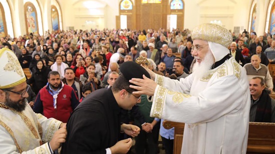 Bishop Pfnotious ordains a new priest in Samalout