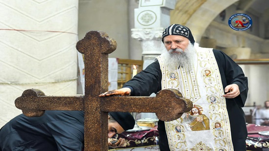 Bishop Marcus perfumes the tomb of St. Demiana in Belqas

