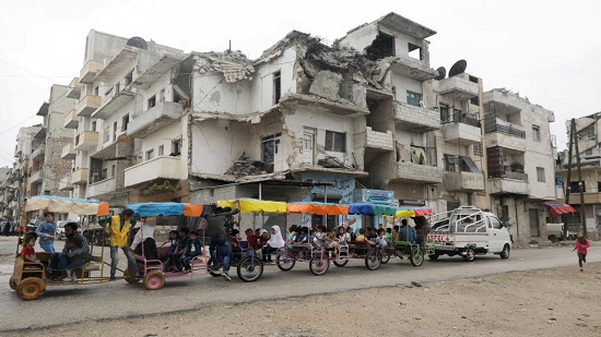 Shelling in Syria rebel enclave kills 7, including children

