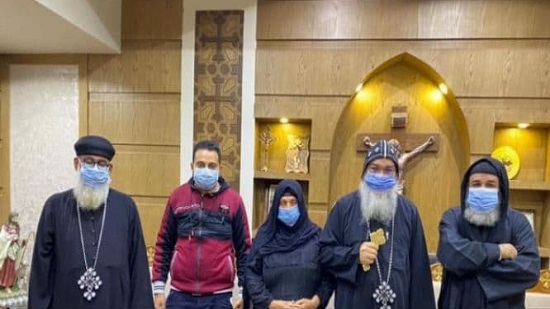 Bishop of Minya receives the lady of Karm village