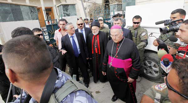 Iraqi Christians mourn after church siege kills 52	