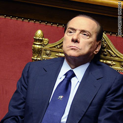 Italy's Berlusconi wins one confidence vote but faces another

