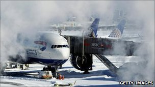 Airports reopen after monster blizzard in north-east US
