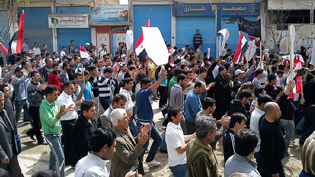 Syrian marchers: Free our men
