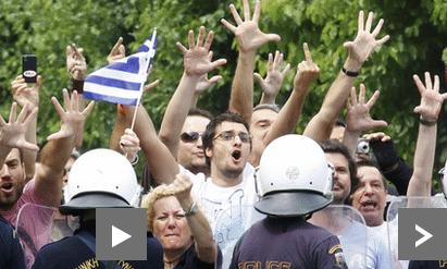 Greece: General strike begins as MPs debate austerity
