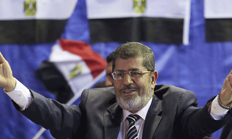 Egypt Brotherhood seeks to reunite with revolutionaries as new battle looms