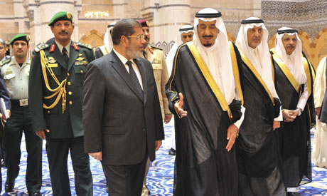 President Morsi returns to Egypt after a quick visit to Saudi Arabia 