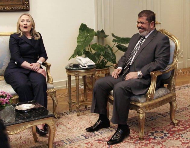 Clinton to Morsy: Find way out of crisis
