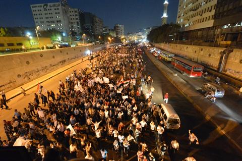 Thousands march to mark killing of Egyptian Copts