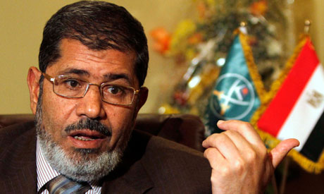 Morsi heads to Pakistan for rare Muslim summit