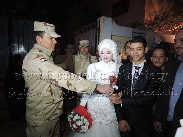 Newlyweds celebrate their wedding at referendum polling station