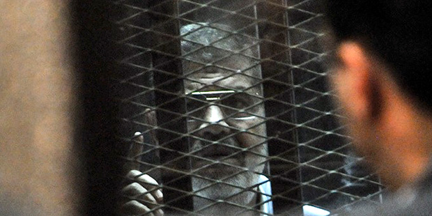Morsi’s lawyer obligated to defend him yet supports June 30
