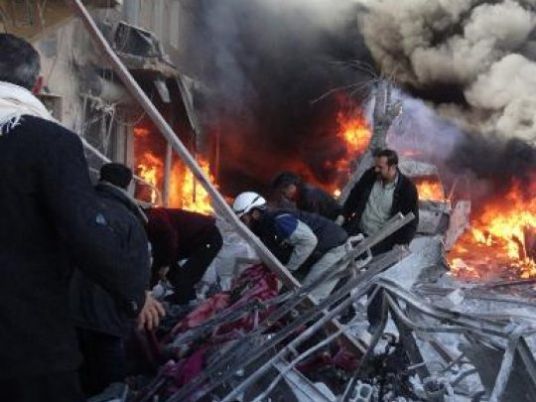 13 dead in Syria regime raids on IS-held town