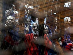 Egypt court orders retrial of 77 Muslim Brotherhood supporters